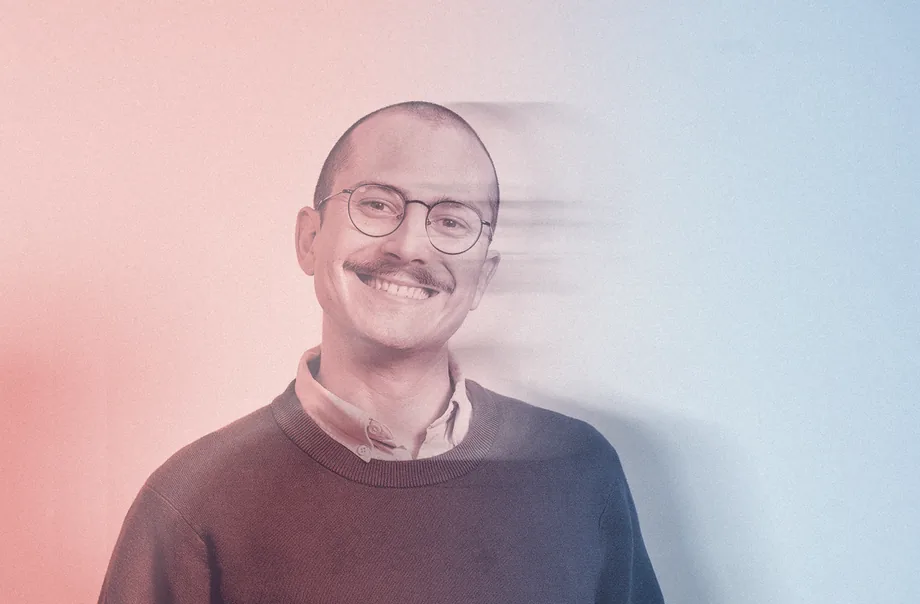 Portrait of a GRAUW. team member smiling, with a pink-to-blue colour wash